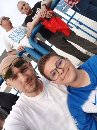 My son and me at a football match.
